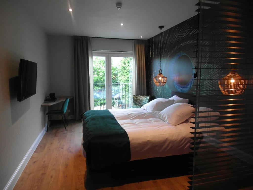 Двухместный (Улучшенный двухместный номер с 1 кроватью) отеля Hotel Sanders de Paauw, Берген-оп-Зом