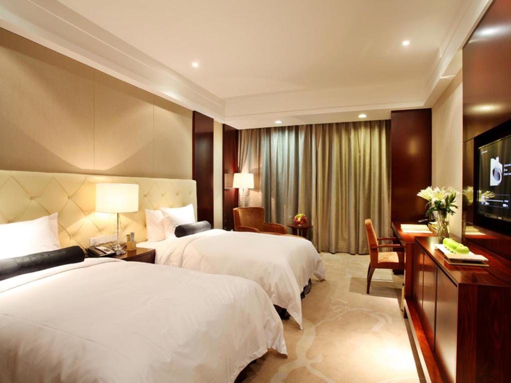 Двухместный (Двухместный номер Делюкс с 2 отдельными кроватями) отеля Grand Barony Xi'an, Сиань