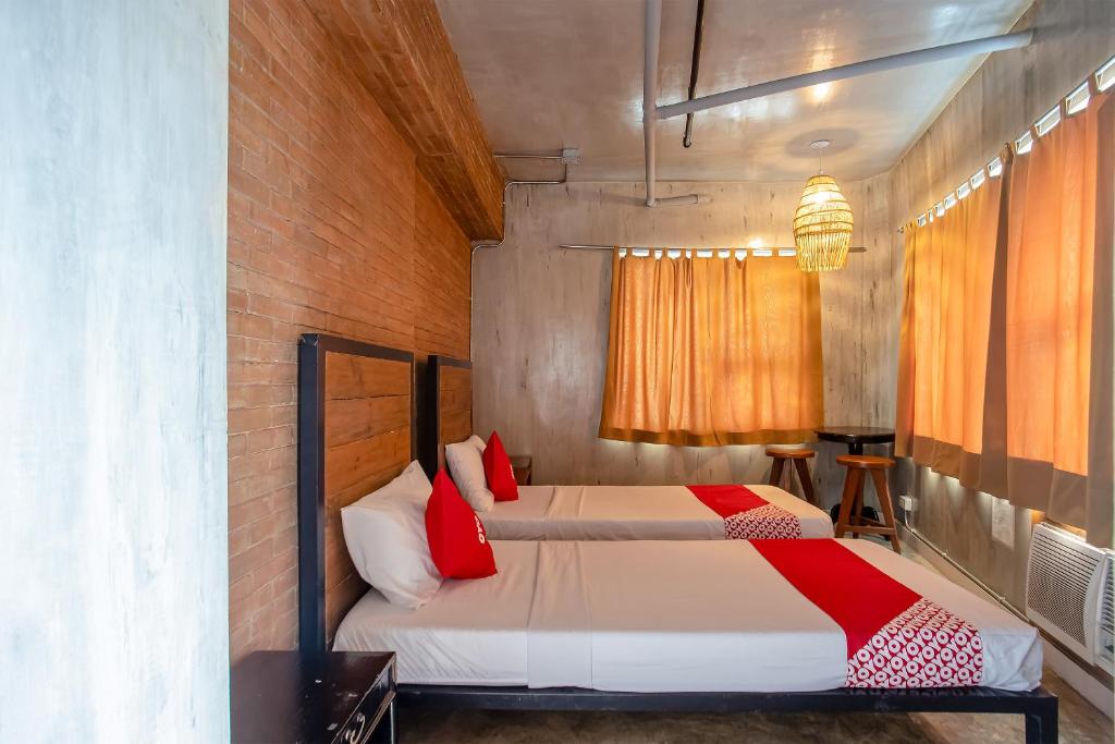 Двухместный (Двухместный номер Делюкс с 2 отдельными кроватями) отеля Connector Hostel, Манила