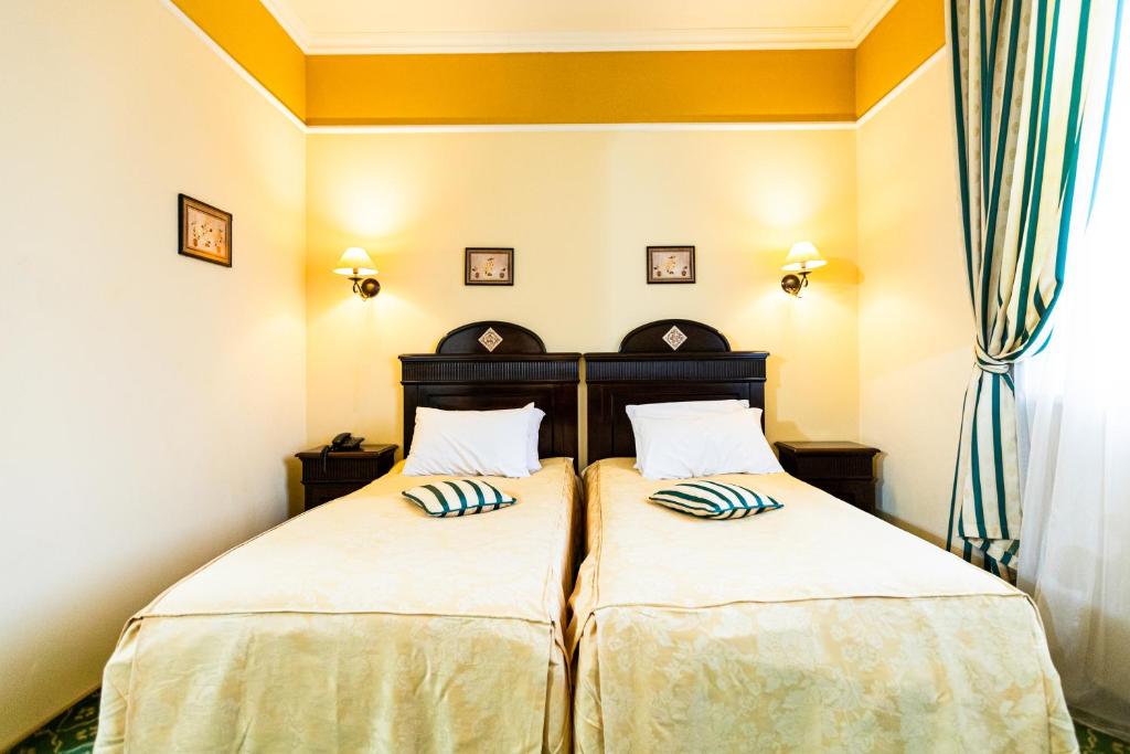 Двухместный (Двухместный номер Делюкс с 2 отдельными кроватями) отеля Koronna Hotel, Тимишоара