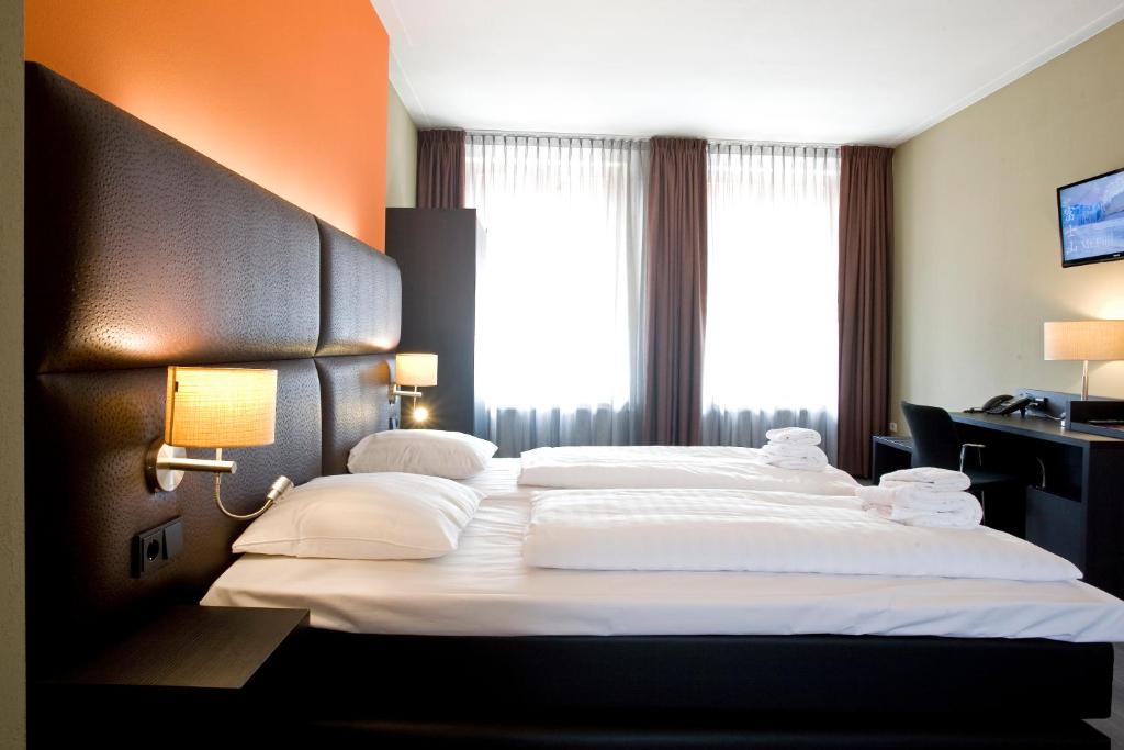 Двухместный (Классический двухместный номер с 2 отдельными кроватями) отеля Hotel Roermond, Рурмонд
