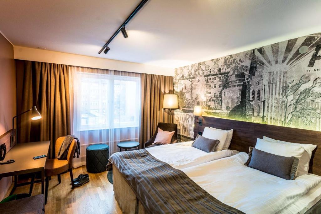 Двухместный (Улучшенный двухместный номер с 2 отдельными кроватями) отеля Scandic Grand Hotel, Эребру