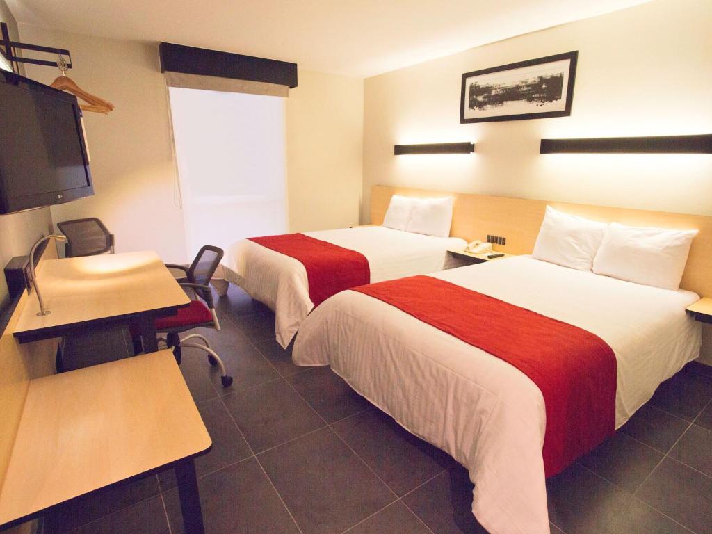 Двухместный (Стандартный двухместный номер с 2 двуспальными кроватями) отеля City Express Salina Cruz, Салина-Крус