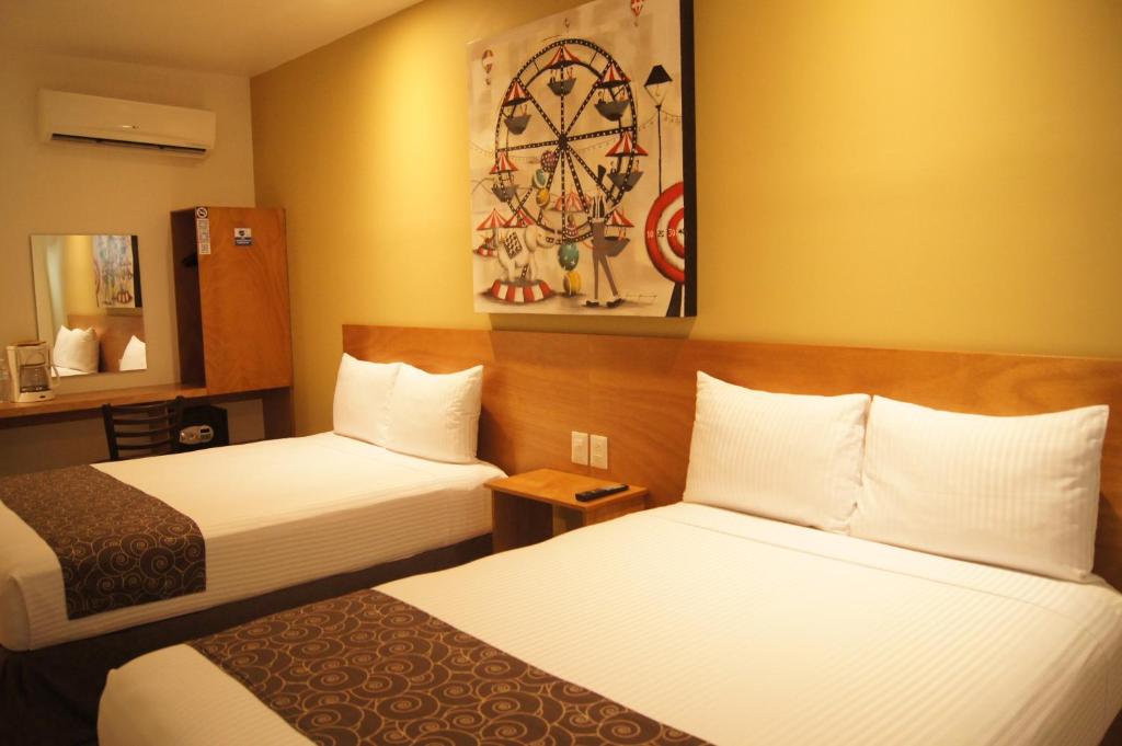 Двухместный (Двухместный номер Делюкс с 2 отдельными кроватями) отеля AM Hotel y Plaza, Санта-Крус-Хуатулко