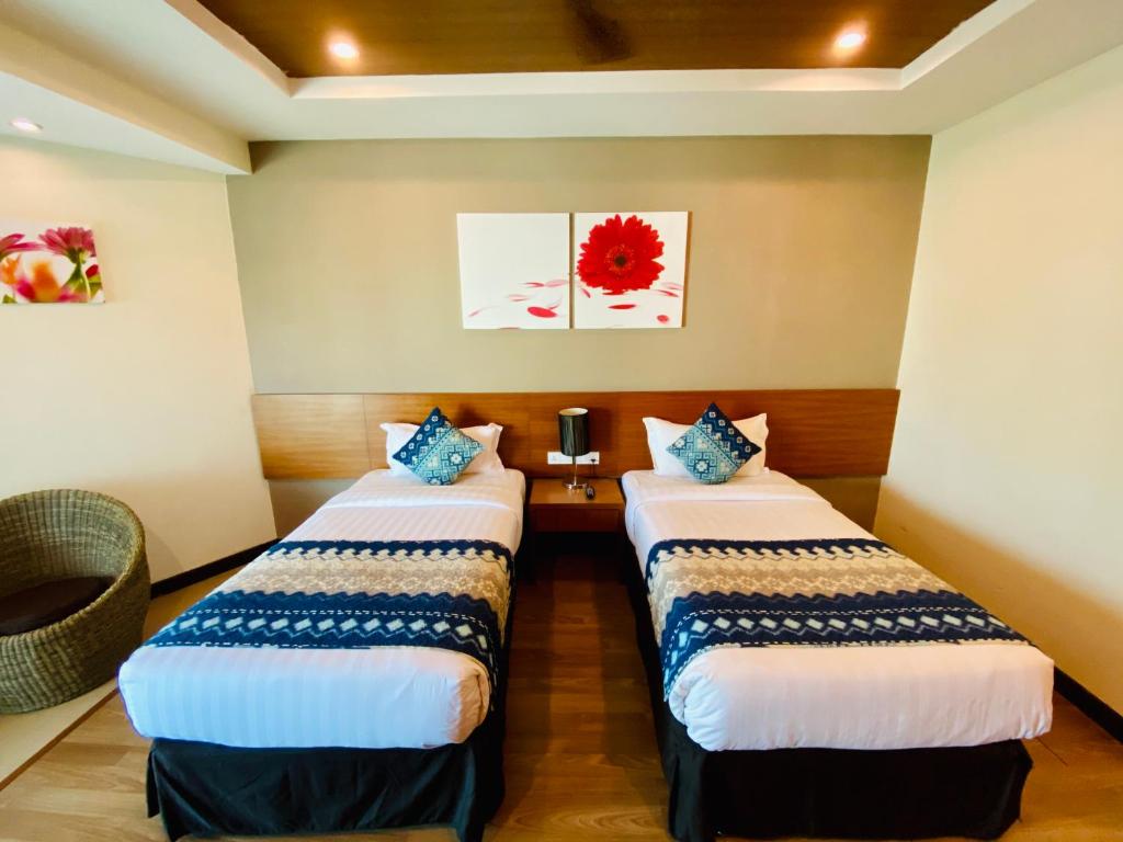 Двухместный (Улучшенный двухместный номер с 2 отдельными кроватями) отеля Langkawi Seaview Hotel, Лангкави