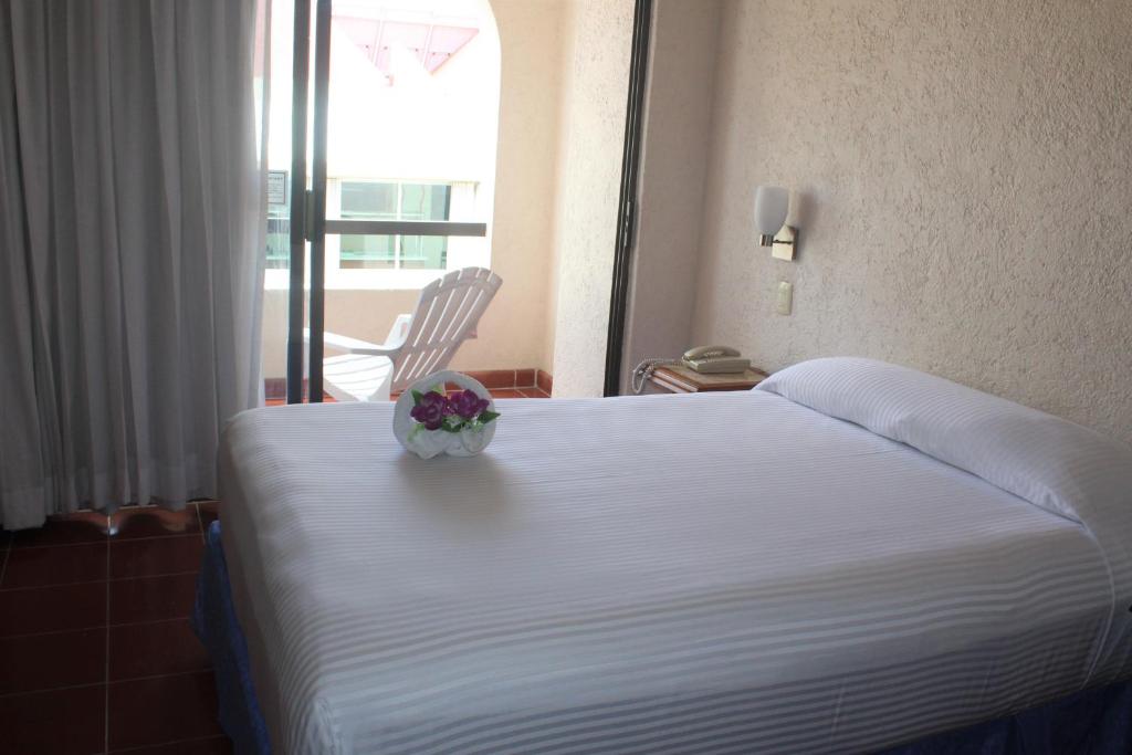 Двухместный (Стандартный номер с балконом) отеля Suites Bahia, Косумель