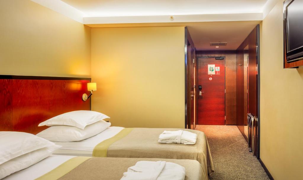 Двухместный (Двухместный номер с 2 отдельными кроватями и доступом в спа-центр) отеля Meresuu Spa & Hotel, Нарва Йыэсуу