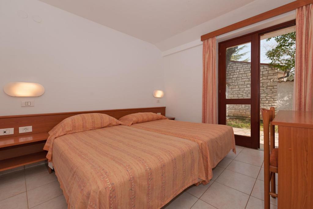 Апартаменты (Улучшенные апартаменты с 2 спальнями) курортного отеля Villas Rubin Resort, Ровинь