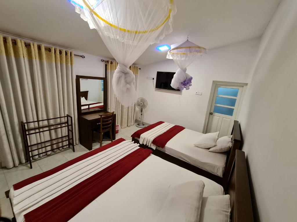 Двухместный (Двухместный номер с 2 отдельными кроватями) отеля Hotel Serandib Hill, Бандаравела