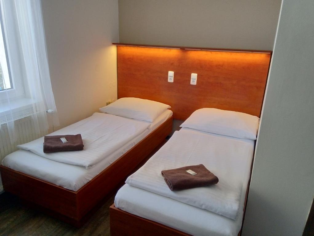 Двухместный (Двухместный номер с 2 отдельными кроватями и собственной ванной комнатой) гостевого дома Beta, Прага