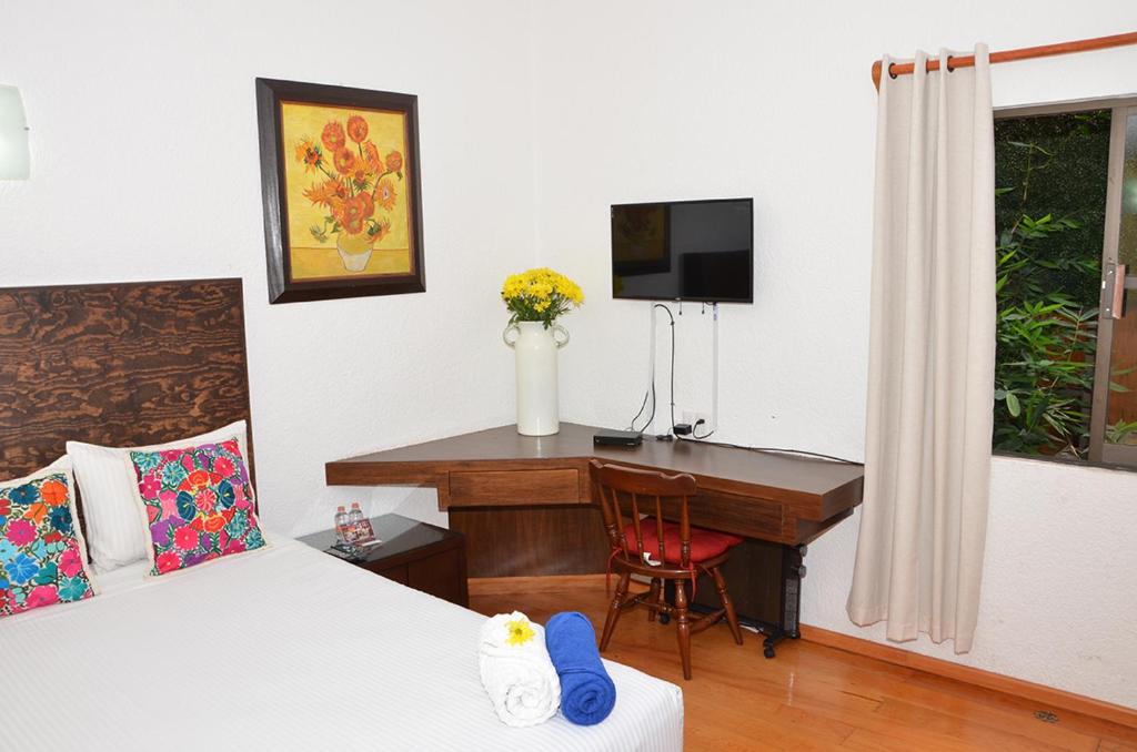 Двухместный (Двухместный номер с 2 отдельными кроватями) отеля La Casita de Coyoacán, Мехико