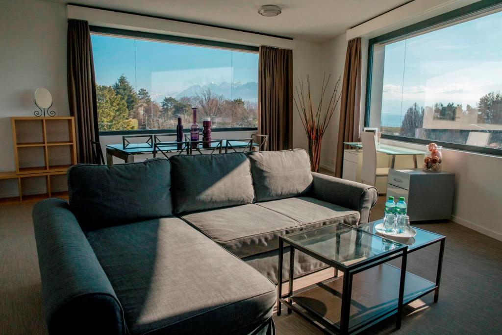Апартаменты (Семейные апартаменты с видом на озеро) апарт-отеля Apart'Hotel 46a, Лозанна