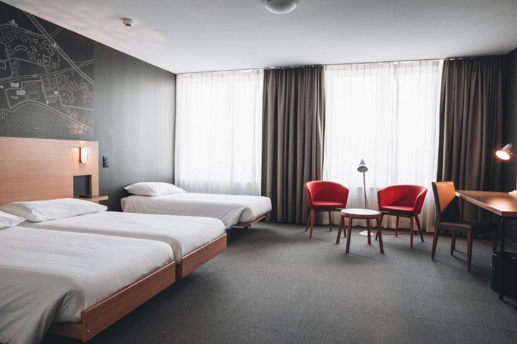 Трехместный (Классический трехместный номер) отеля SwissTech Hotel, Лозанна
