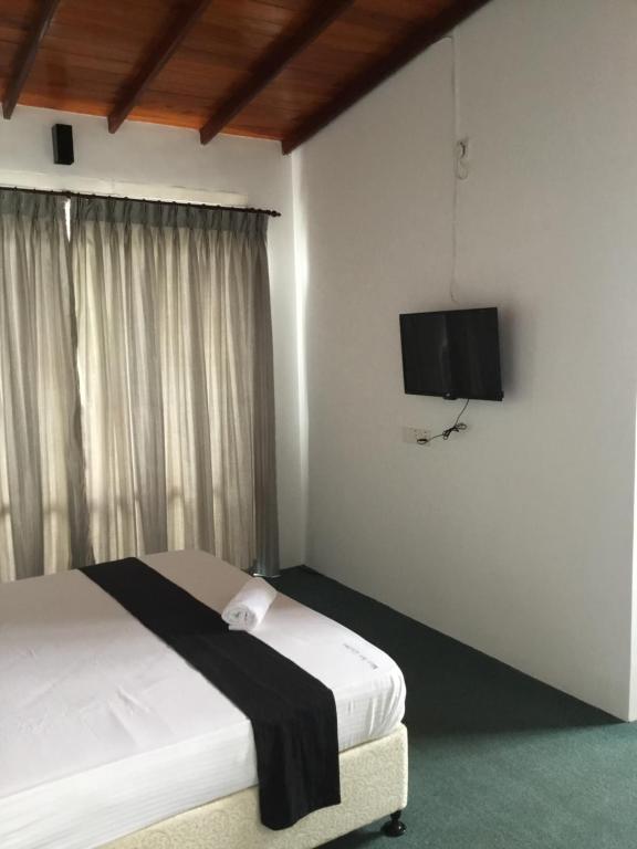 Двухместный (Двухместный номер с 1 кроватью и собственной ванной комнатой) отеля West Inn Colombo, Коломбо