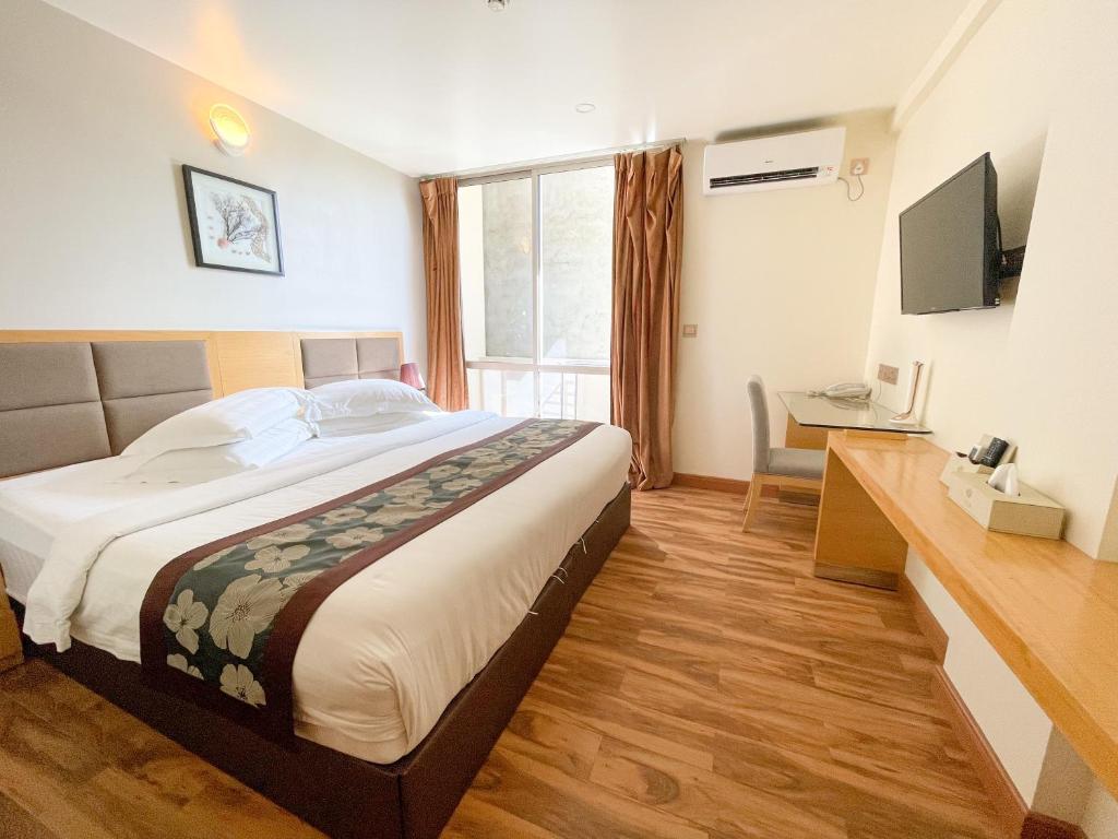 Двухместный (Двухместный номер эконом-класса с 2 отдельными кроватями) гостевого дома Season Paradise, Тулусду