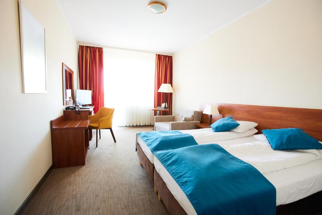 Двухместный (Стандартный двухместный номер с 2 отдельными кроватями) отеля Hotel Mazury, Гижицко