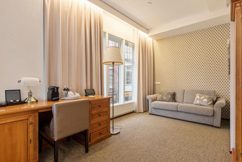 Двухместный (Улучшенный двухместный номер с 2 отдельными кроватями и видом на канал) отеля Dikker en Thijs Fenice Hotel, Амстердам