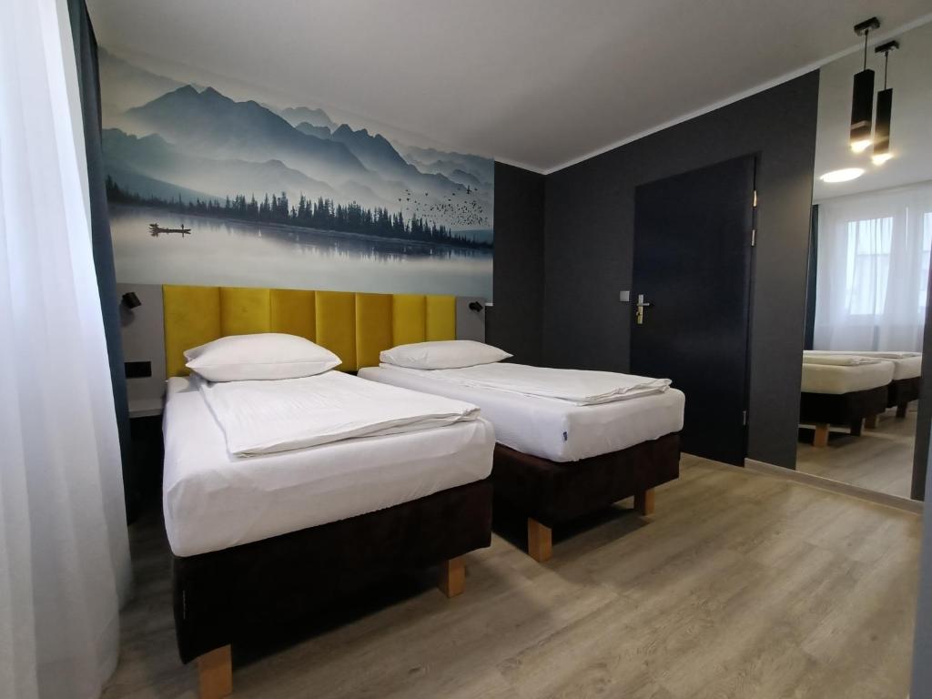 Двухместный (Двухместный номер Делюкс с 2 отдельными кроватями) отеля Hotel Pomorski, Быдгощ