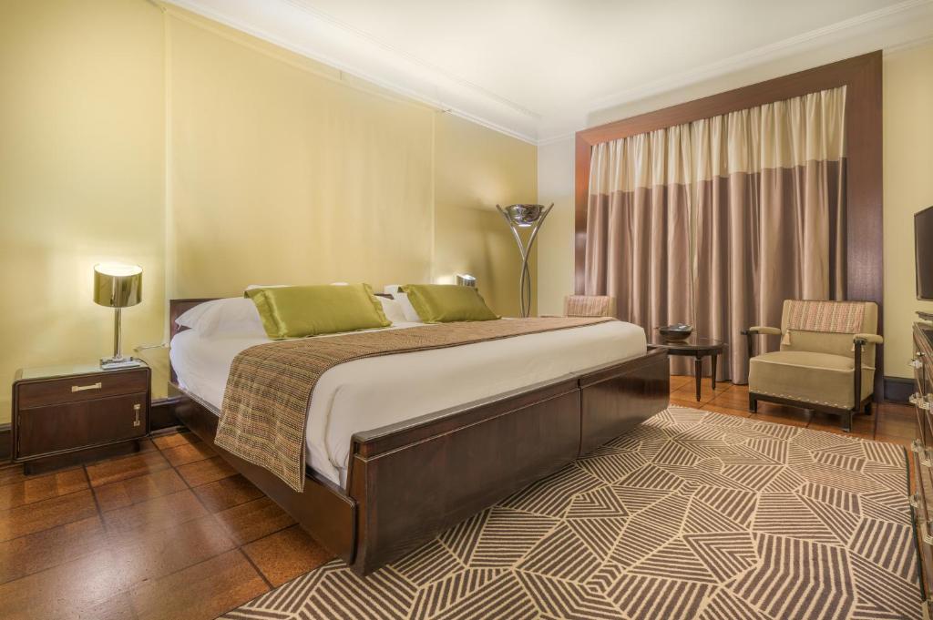 Двухместный (Улучшенный двухместный номер с 1 кроватью или 2 отдельными кроватями) отеля Hotel Britania, Лиссабон