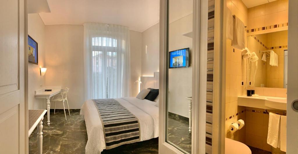 Двухместный (Улучшенный двухместный номер с 2 отдельными кроватями и видом на парк) отеля Continental Parkhotel, Лугано