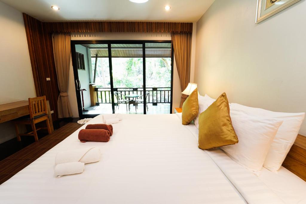 Двухместный (Двухместный номер Делюкс с 1 кроватью или 2 отдельными кроватями, вид на сад) курортного отеля Tanote Villa Hill, Ко Тао