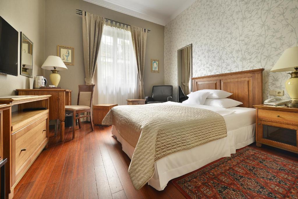 Одноместный (Классический одноместный номер с бесплатным мини-баром) отеля Marrol's Boutique Hotel, Братислава