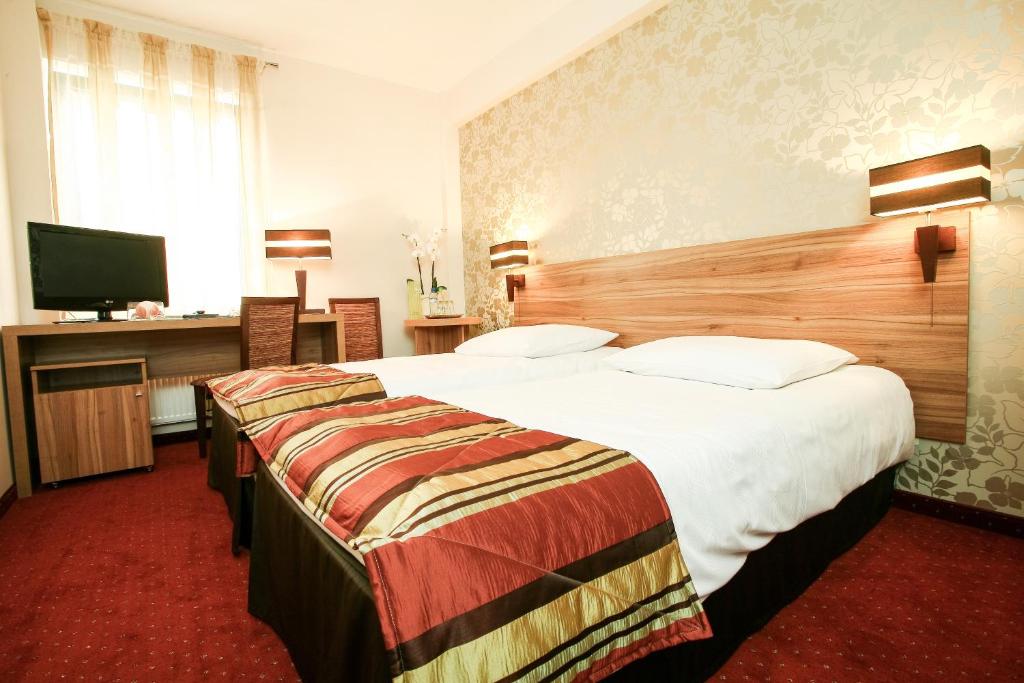 Двухместный (Двухместный номер с 2 отдельными кроватями) отеля Duet Hotel, Вроцлав
