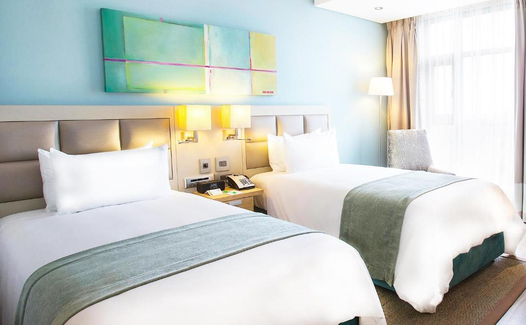 Двухместный (Стандартный двухместный номер с 1 кроватью или 2 отдельными кроватями) отеля Holiday Inn Mauritius Mon Trésor, Блу-Бей