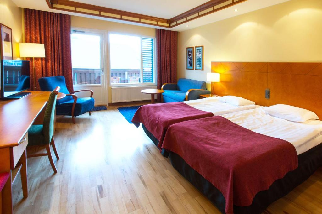 Двухместный (Улучшенный двухместный номер с 2 отдельными кроватями) отеля Cumulus Resort Rukahovi, Рука