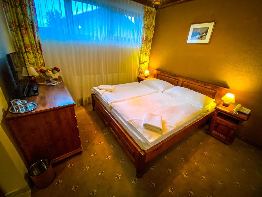 Двухместный (Двухместный номер эконом-класса с 2 отдельными кроватями) отеля Horsky Hotel Encian Donovaly, Доновалы