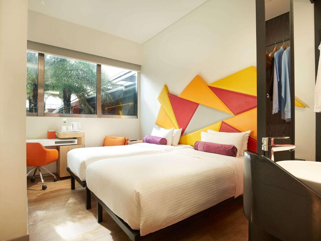 Двухместный (Стандартный двухместный номер с 2 отдельными кроватями и видом на бассейн) отеля Ibis Styles Singapore On Macpherson, Сингапур (город)