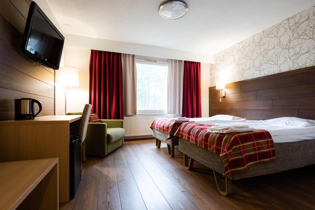 Двухместный (Двухместный номер с 2 отдельными кроватями и сауной) отеля Lapland Hotels Sirkantähti, Леви