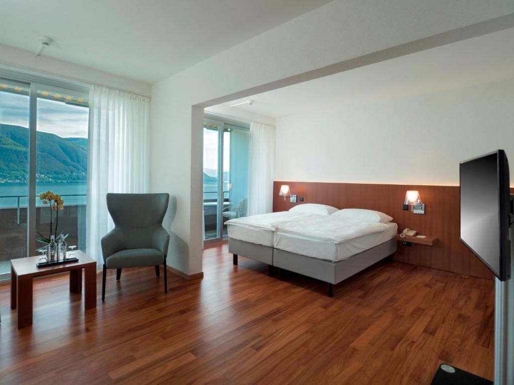 Сьюит (Barrier-free Junior Suite with air condition) отеля Casa Berno Swiss Quality Hotel, Аскона