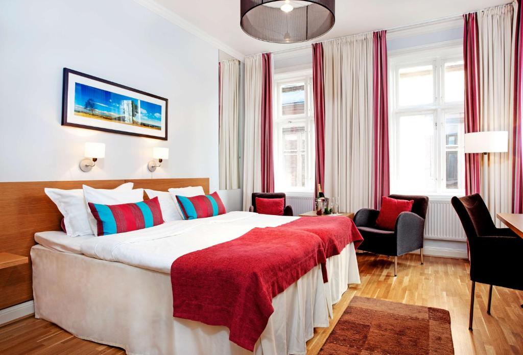 Двухместный (Улучшенный двухместный номер с 2 отдельными кроватями) отеля Scandic Stortorget, Мальме