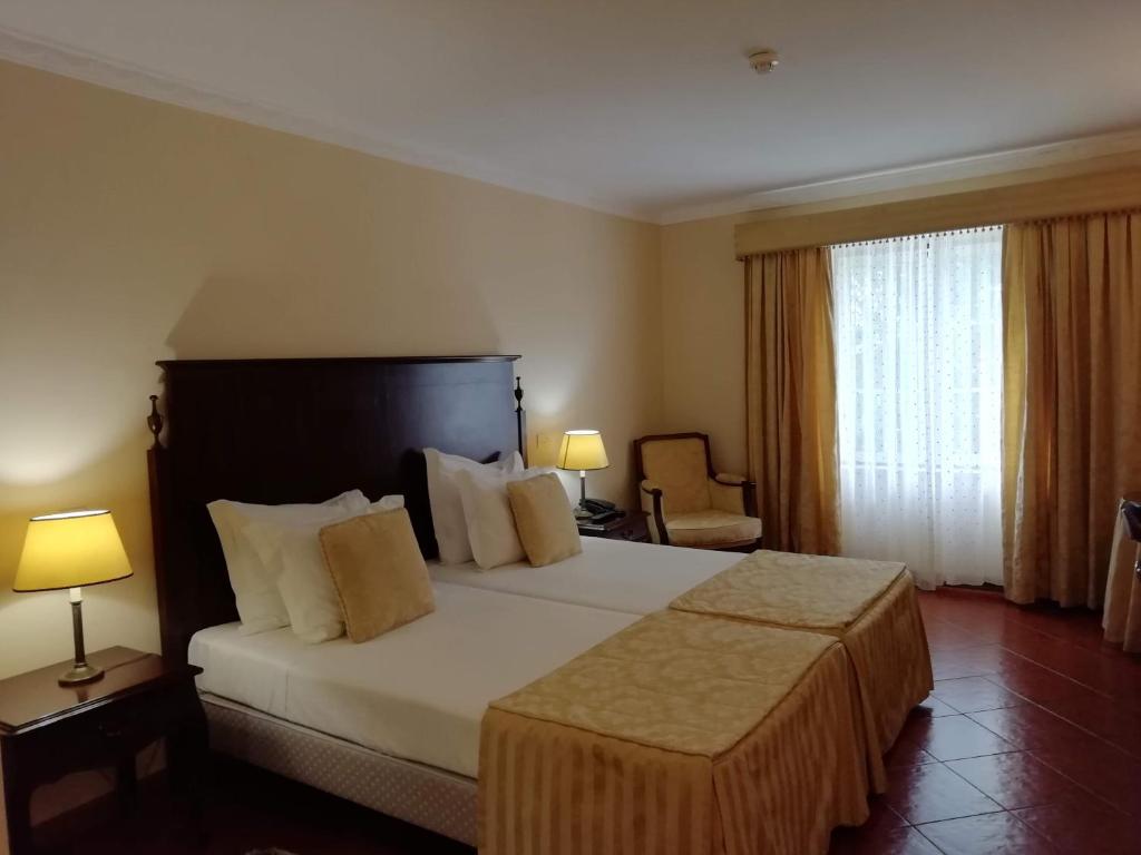 Двухместный (Стандартный двухместный номер с 2 отдельными кроватями) отеля Hotel Club d'Azeitao, Сетубал