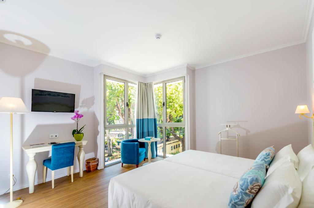 Двухместный (Улучшенный двухместный номер с 1 кроватью или 2 отдельными кроватями) отеля Hotel Madeira, Фуншал