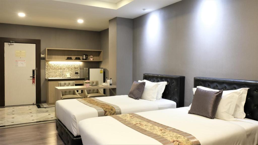 Двухместный (Двухместный номер Делюкс с 2 отдельными кроватями) отеля KTK Regent Suite, Паттайя