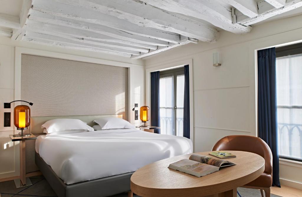 Двухместный (Улучшенный двухместный номер с 1 кроватью или 2 отдельными кроватями) отеля Hotel Opéra Richepanse, Париж