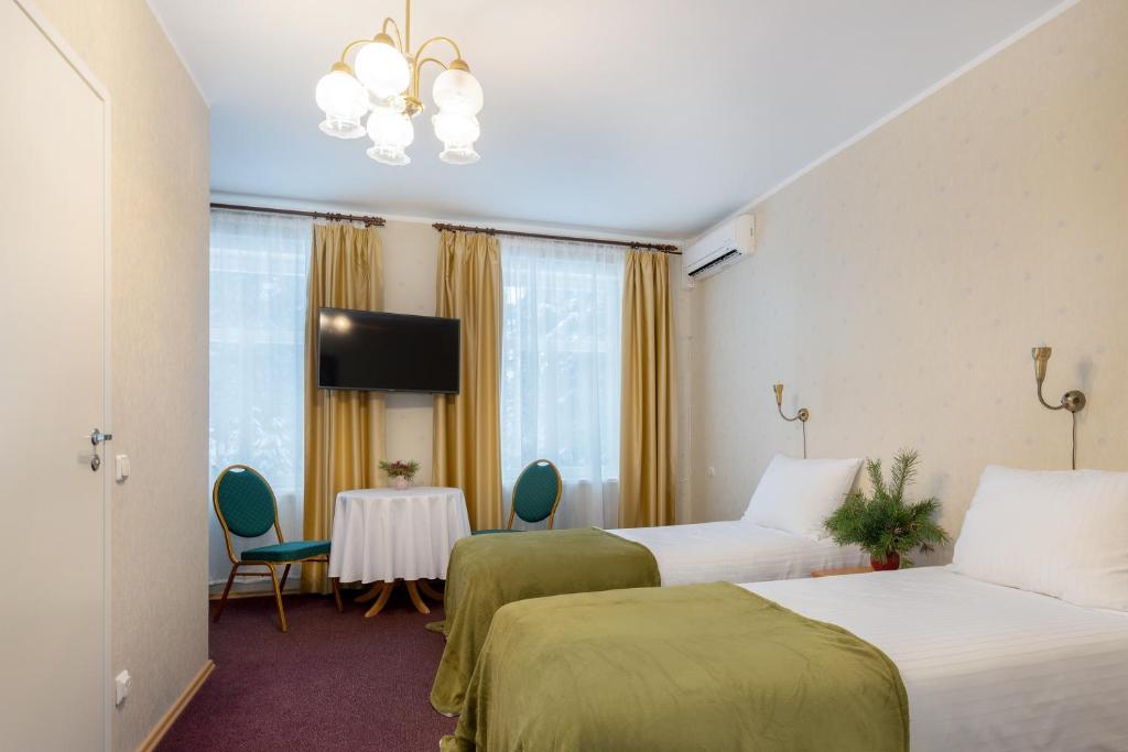 Двухместный (Стандартный двухместный номер с 1 кроватью или 2 отдельными кроватями и видом на сад) отеля Verevi Motel, Элва