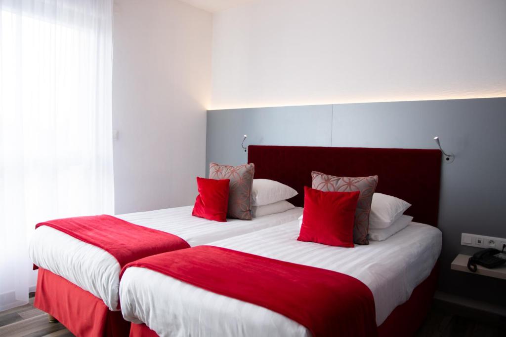 Двухместный (Двухместный номер «Комфорт» с 2 отдельными кроватями) отеля Colmar Hotel, Кольмар