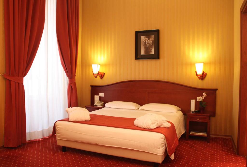 Двухместный (Двухместный номер «Комфорт» с 1 кроватью или 2 отдельными кроватями) отеля Augusta Lucilla Palace, Рим