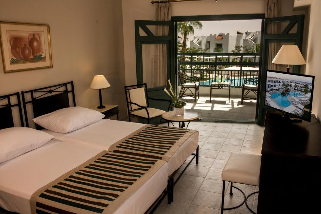 Двухместный (Стандартный двухместный номер с 2 отдельными кроватями и видом на бассейн) курортного отеля Sol Y Mar Naama Bay, Шарм-эль-Шейх