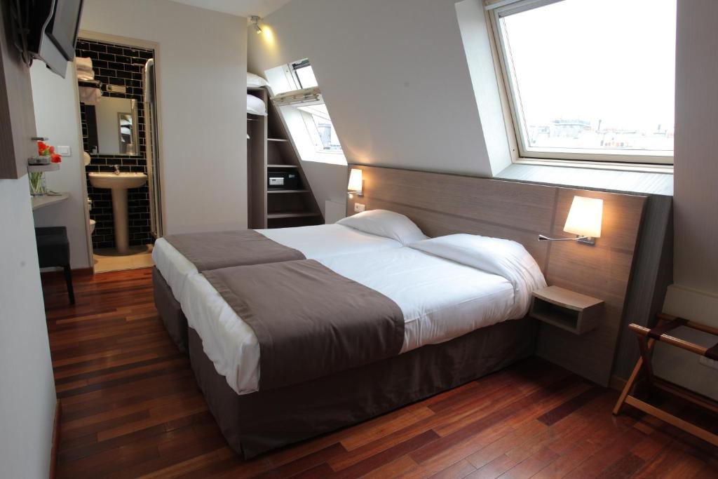 Двухместный (Двухместный номер с 2 отдельными кроватями) отеля Grand Hotel du Loiret, Париж