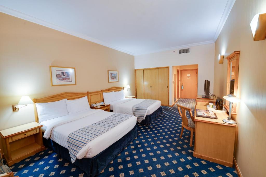 Двухместный (Стандартный двухместный номер с 2 отдельными кроватями) отеля Grand Continental Flamingo Hotel, Абу-Даби