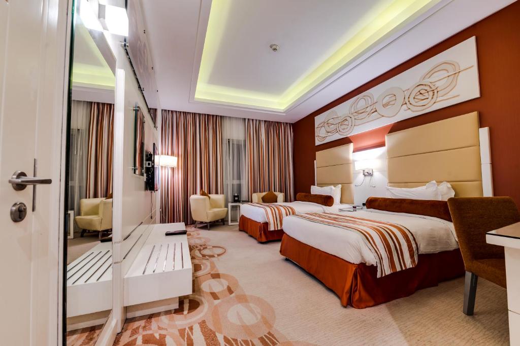 Двухместный (Стандартный двухместный номер с 2 отдельными кроватями) отеля Gloria Downtown Hotel, Абу-Даби