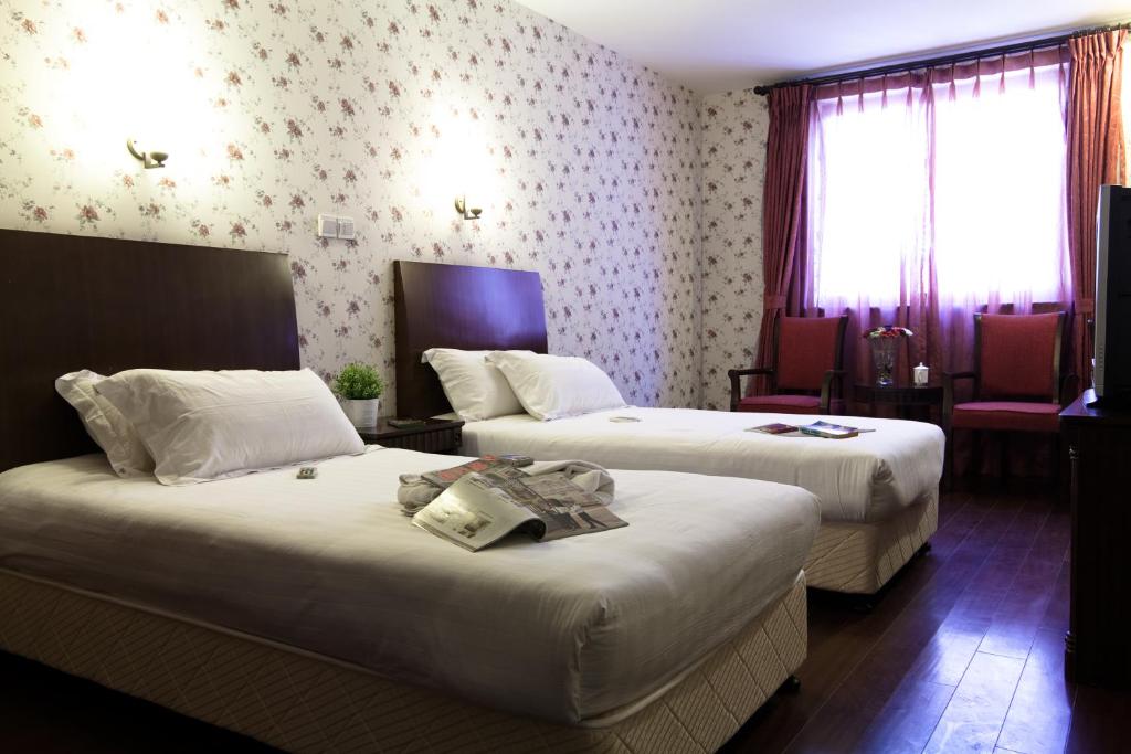 Двухместный (Стандартный двухместный номер с 2 отдельными кроватями) отеля Shijia inn On the Bund, Шанхай
