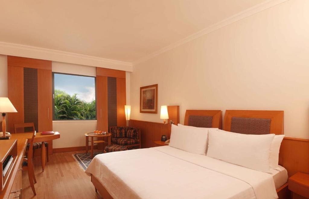 Четырехместный (Двухместный номер Делюкс с 1 кроватью или 2 отдельными кроватями) отеля Trident Chennai, Ченнаи
