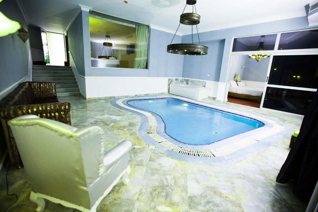 Сьюит (Апартаменты в пентхаусе с 2 спальнями) курортного отеля Paradise Inn Beach Resort, Александрия