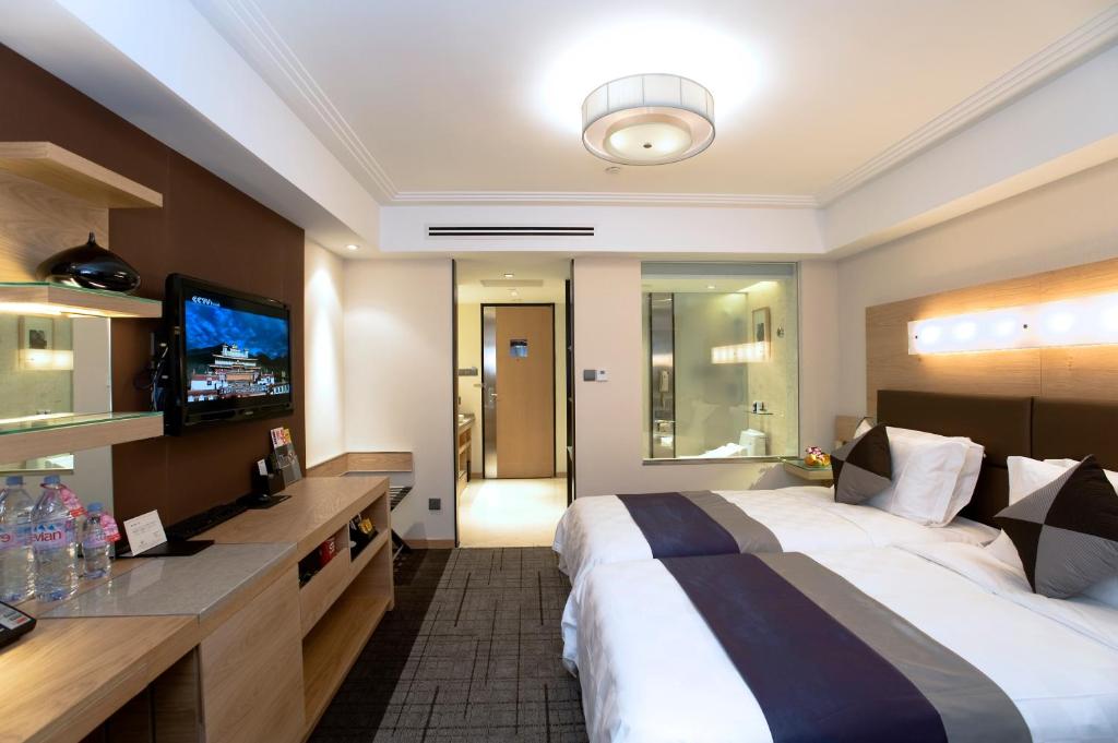 Двухместный (Улучшенный двухместный номер с 1 кроватью) отеля Hotel New Otani Chang Fu Gong, Пекин