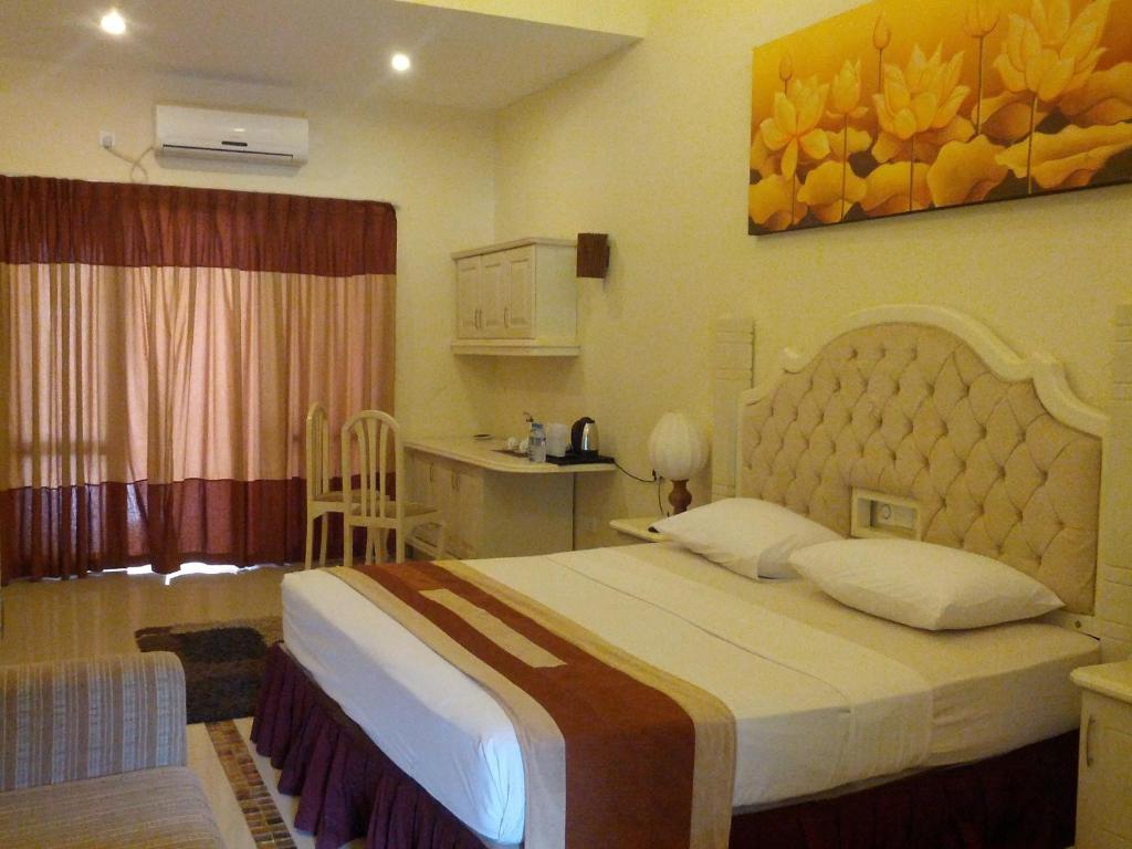 Двухместный (Двухместный номер Делюкс с 1 кроватью или 2 отдельными кроватями) отеля Miridiya Lake Resort, Анурадхапура